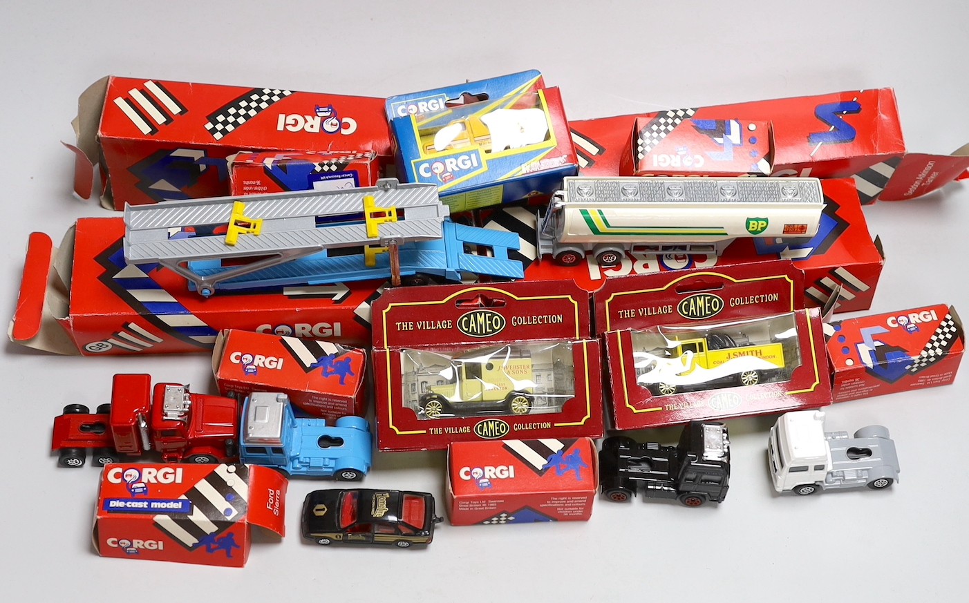 A quantity of corgi cars and trucks